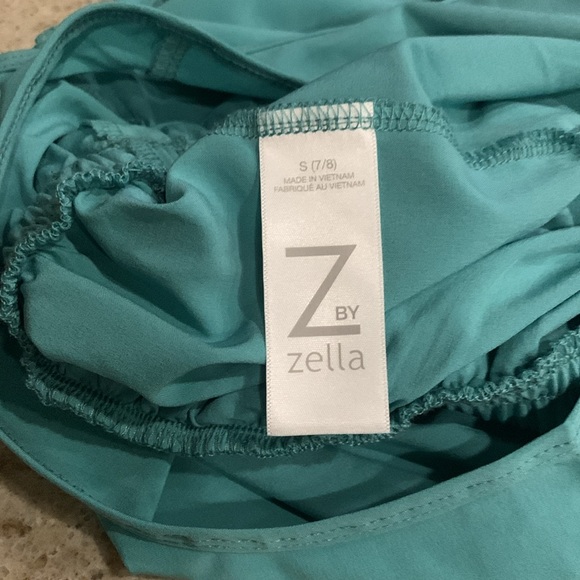 NWOT Z by Zella Girl Sleeveless Ruffle Waist Romper in Teal Lagoon Size 7 - Picture 8 of 10